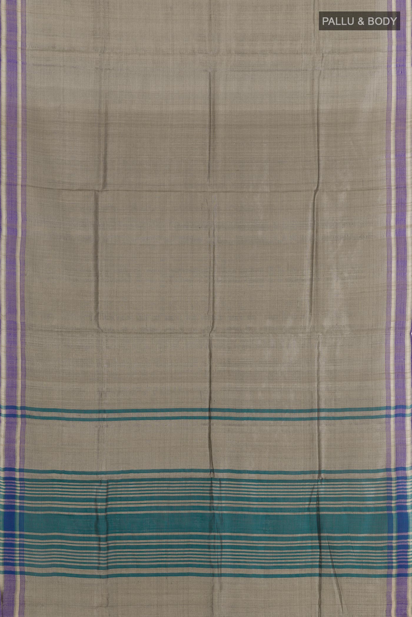 Flat view of Grey Tussar Saree with Printed design on the body and Without Border. 