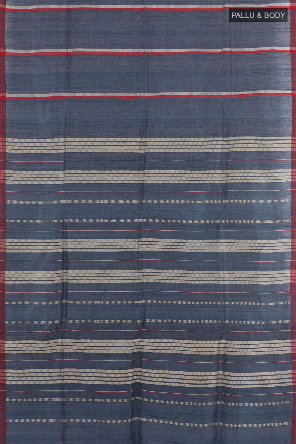 Flat view of Blue Tussar Saree with Stripes on the body and Zari Border. 