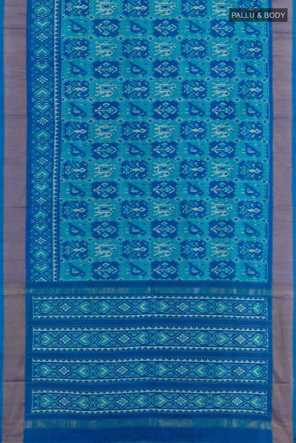 Flat view of Blue Pochampally Silk Saree with Ikat design on the body and Zari Border. 