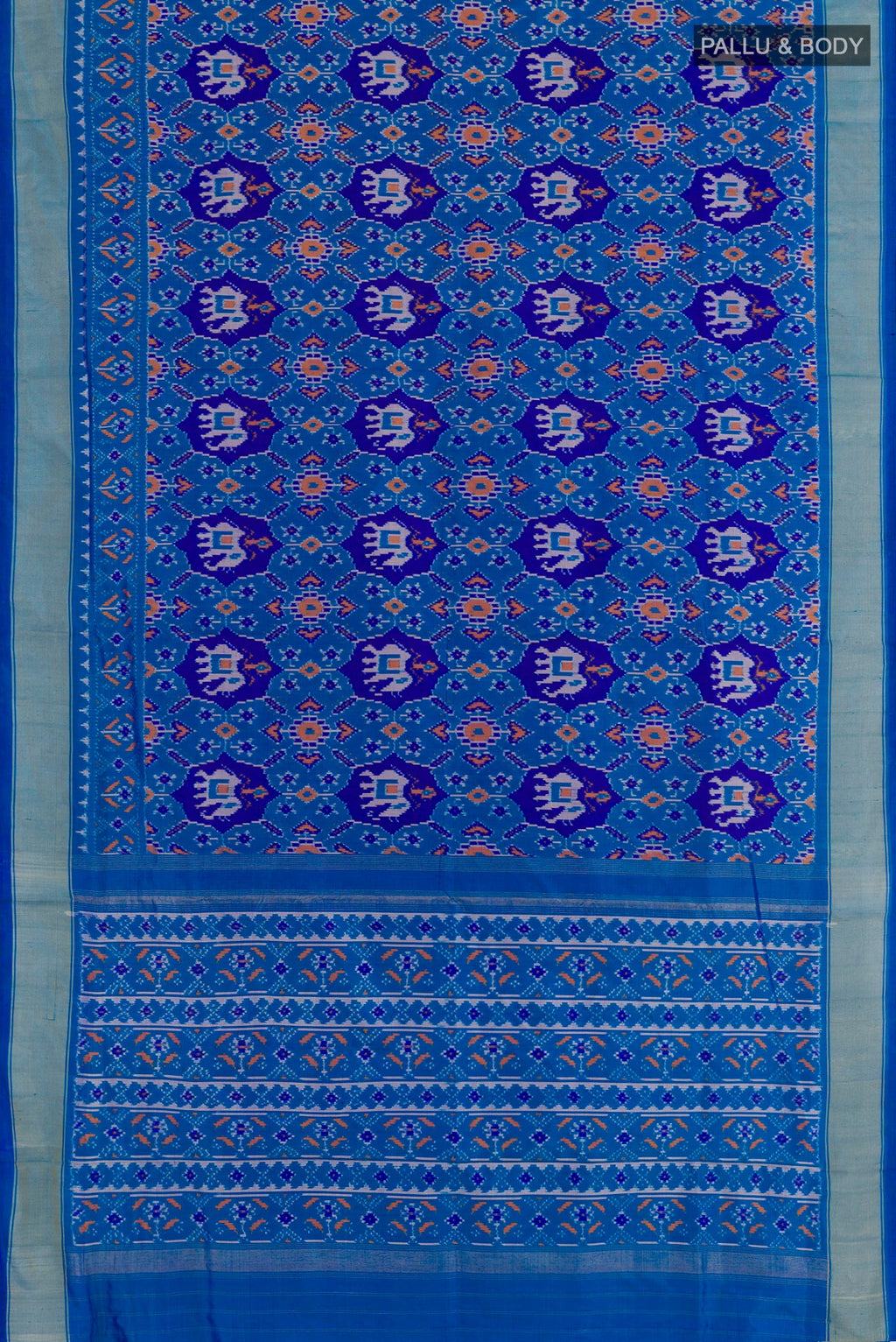 Flat view of Blue Pochampally Silk Saree with Ikat design on the body and Zari Border. 