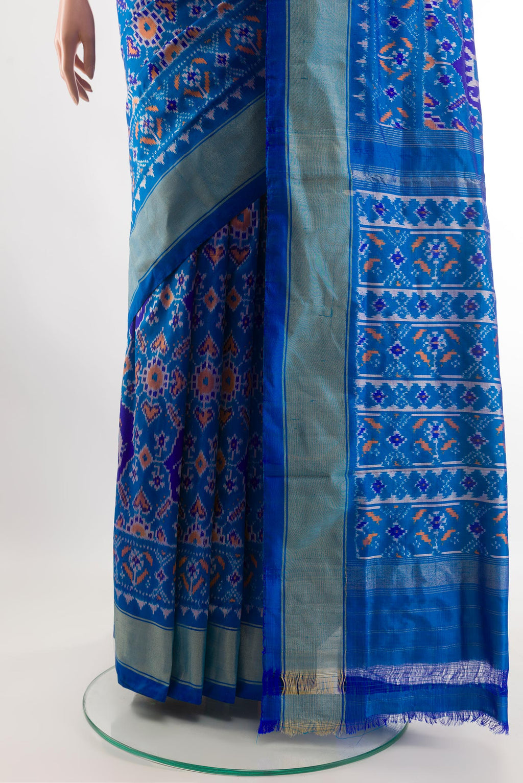 Pleats and pallu of Blue Pochampally Silk Saree with Ikat design on the body and Zari Border. 