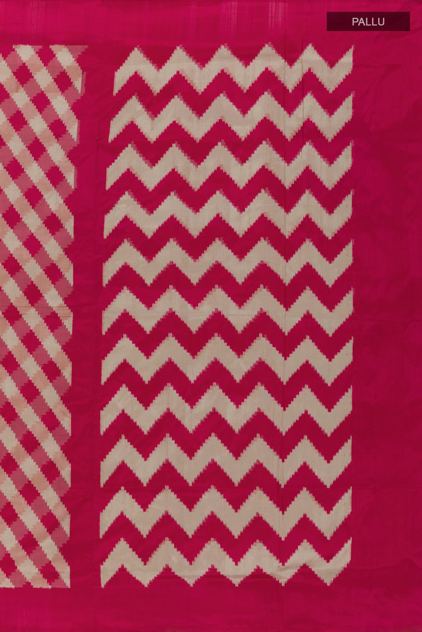 Close up image of the pallu of Pink Pochampally Silk Saree with Pure Ikat on the body and Zari Border. 
