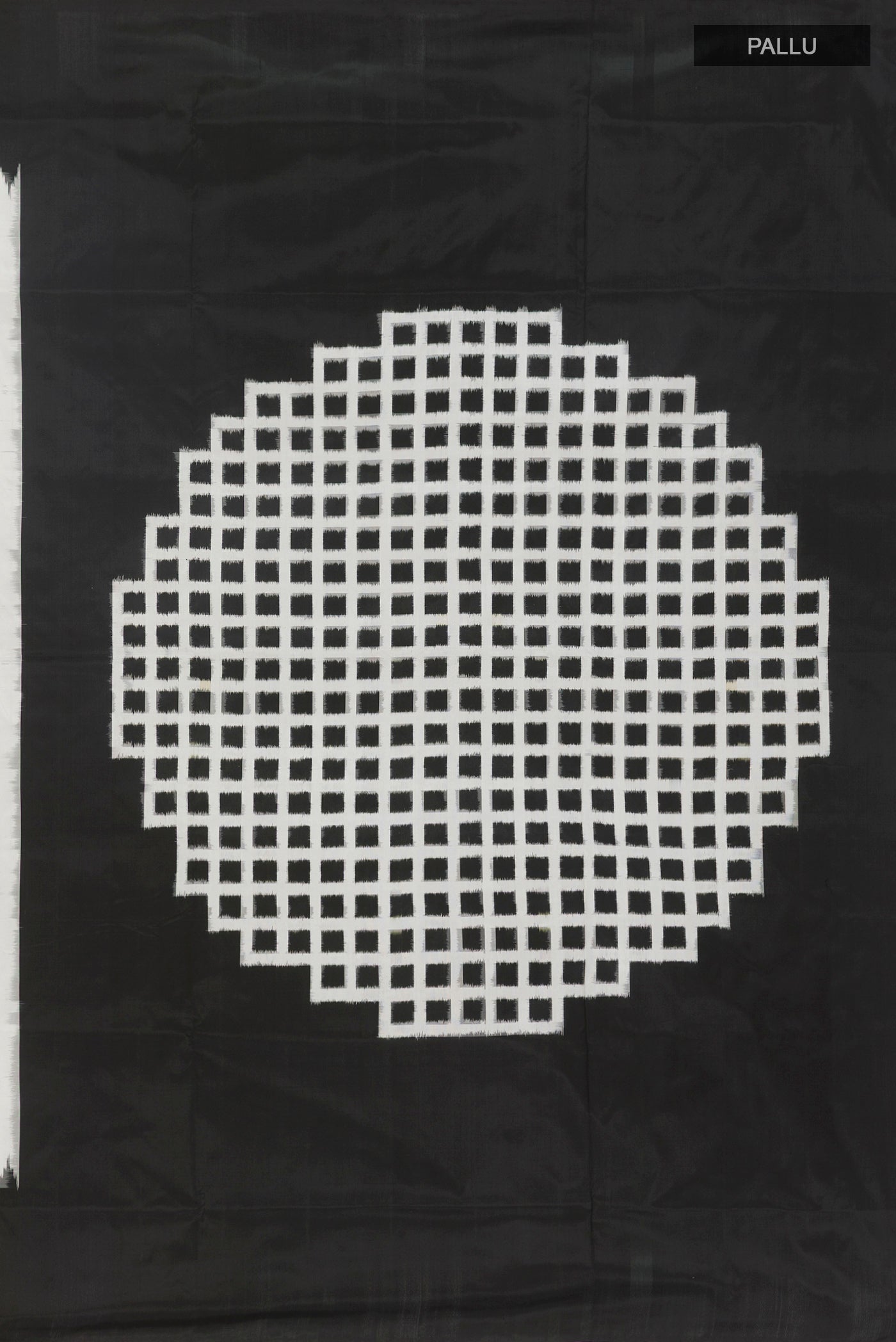 Close up image of the pallu of White Pochampally Silk Saree with Ikat design on the body and Zari Border. 