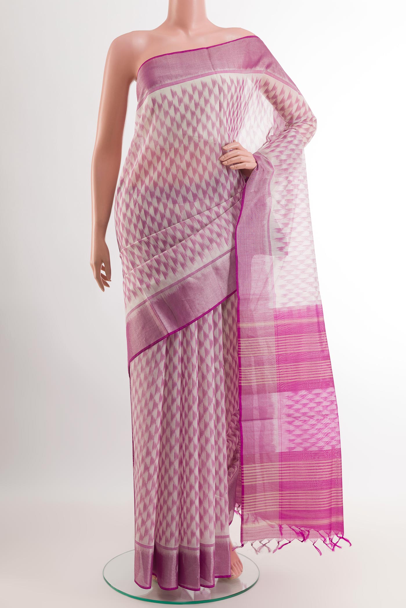 Off White Blended Kora Cotton Saree with Pure Ikat on the body and Zari Border.  displayed on a mannequin