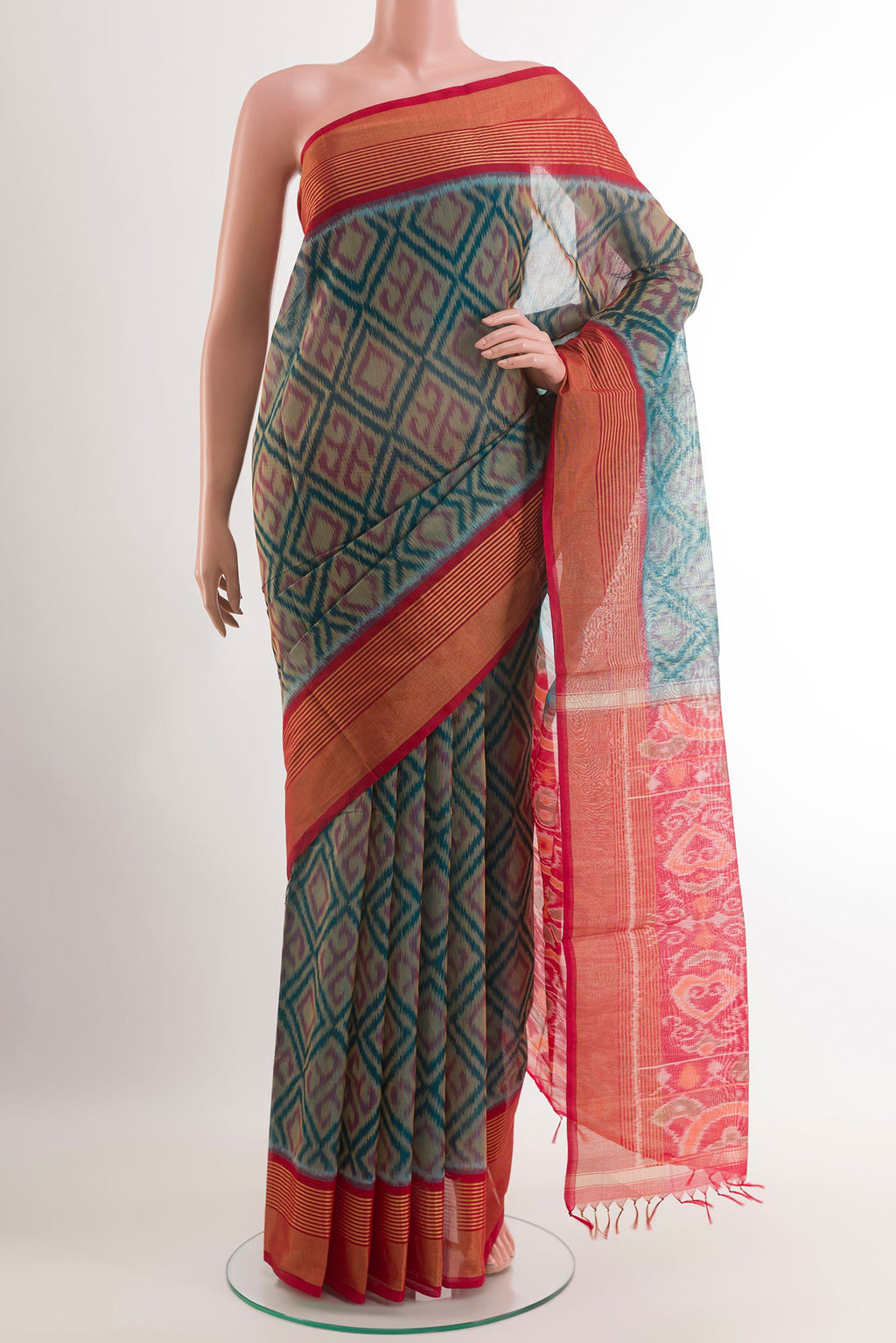 Blue Blended Kora Cotton Saree with Ikat design on the body and Zari Border.  displayed on a mannequin