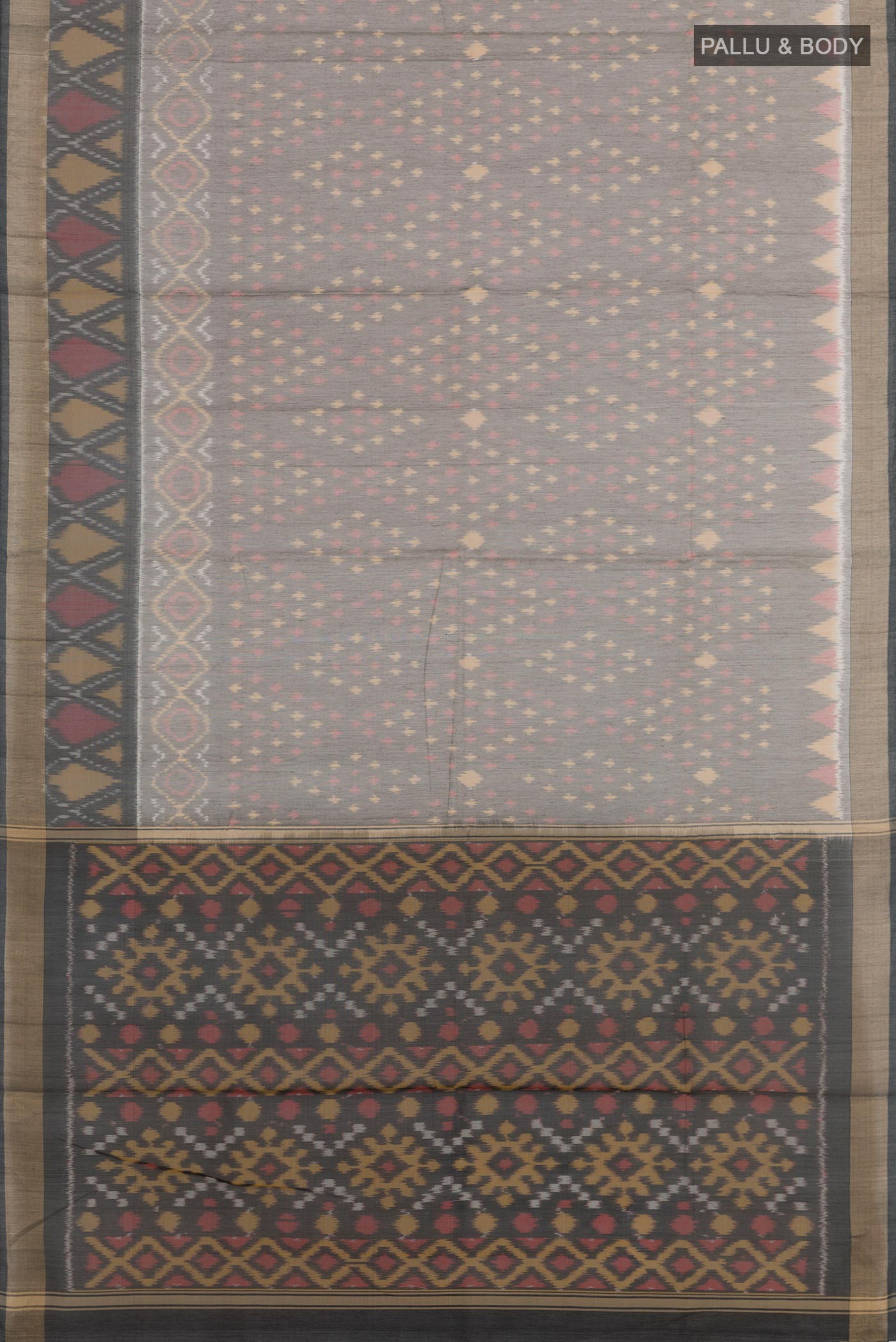 Flat view of Grey Blended Kora Cotton Saree with Ikat design on the body and Zari Border. 