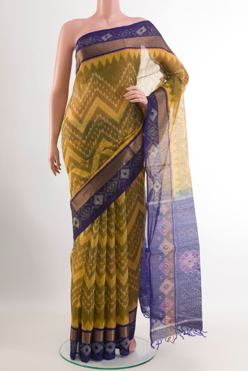 Yellow Blended Kora Cotton Saree with Ikat design on the body and Zari Border.  displayed on a mannequin