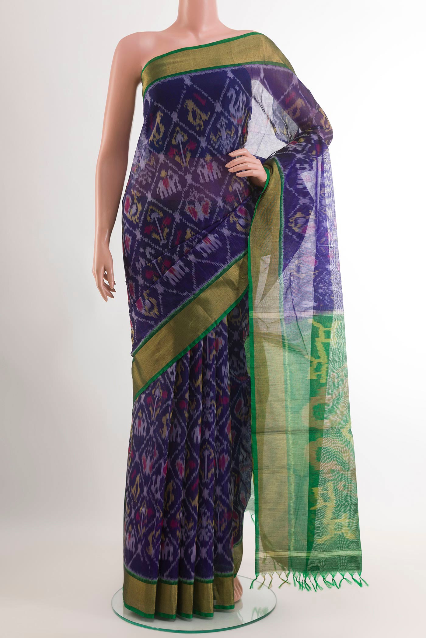 Blue Blended Kora Cotton Saree with Ikat design on the body and Zari Border.  displayed on a mannequin
