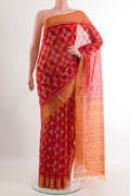 Red Blended Kora Cotton Saree with Ikat design on the body and Zari Border.  displayed on a mannequin