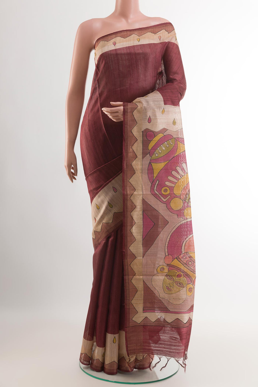 Maroon Tussar Saree with Plain Body and Printed Border.  displayed on a mannequin