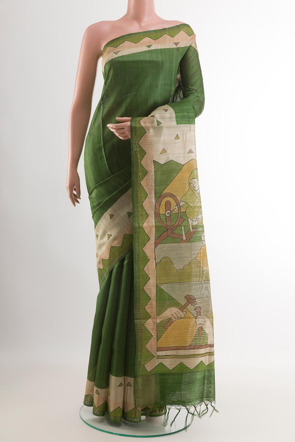Green Tussar Saree with Plain Body and Printed Border.  displayed on a mannequin