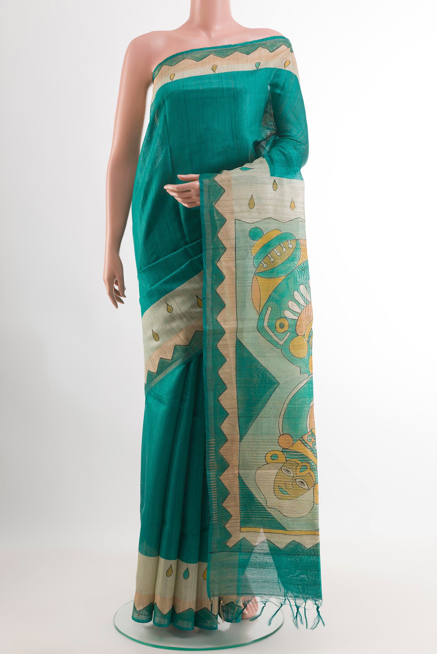 Sea Green Tussar Saree with Plain Body and Zari Border.  displayed on a mannequin