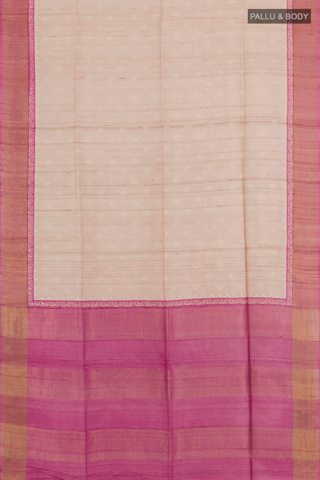 Flat view of Cream Tussar Saree with Thread Butta on the body and Zari Border. 