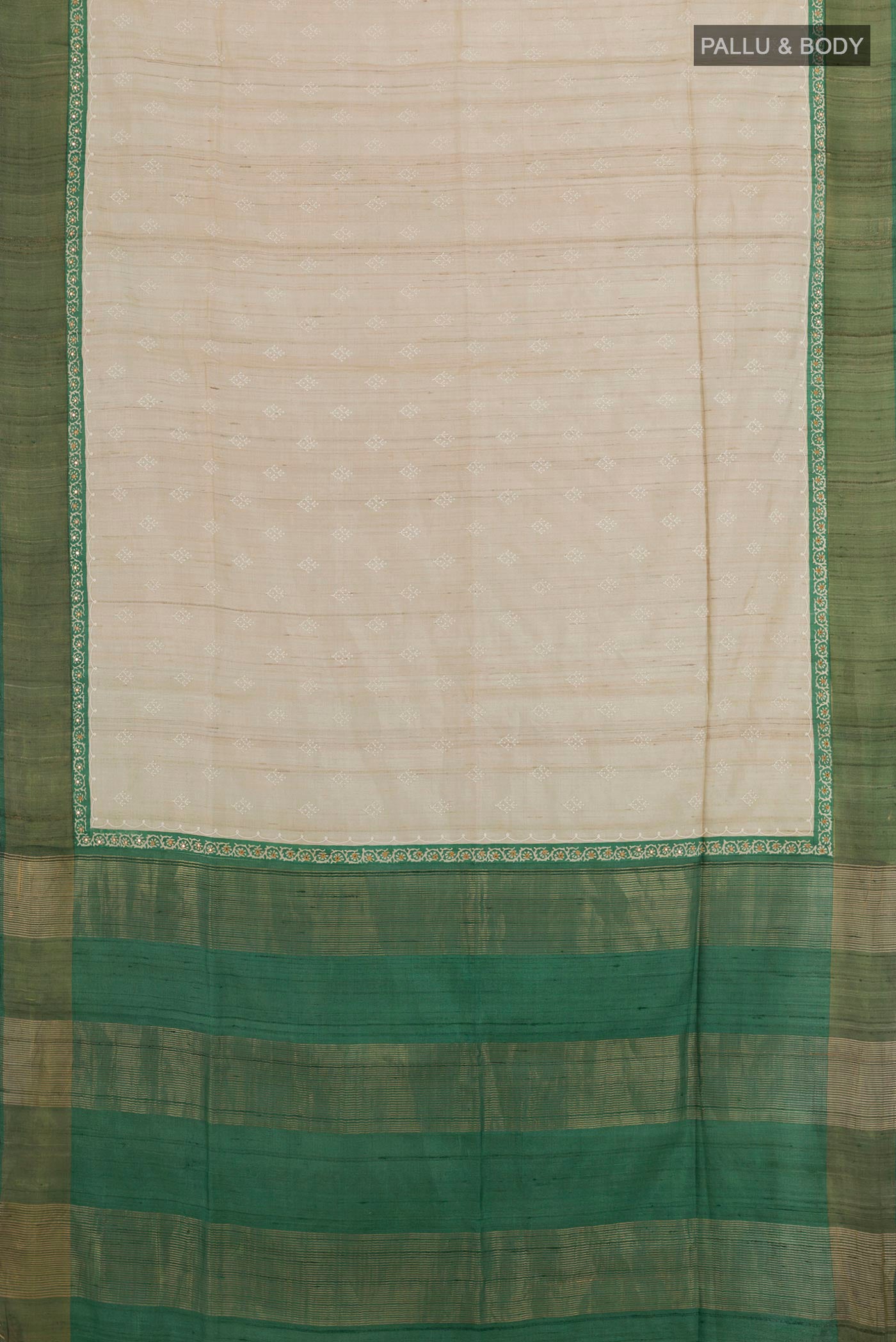 Flat view of Off White Tussar Saree with Thread Butta on the body and Zari Border. 