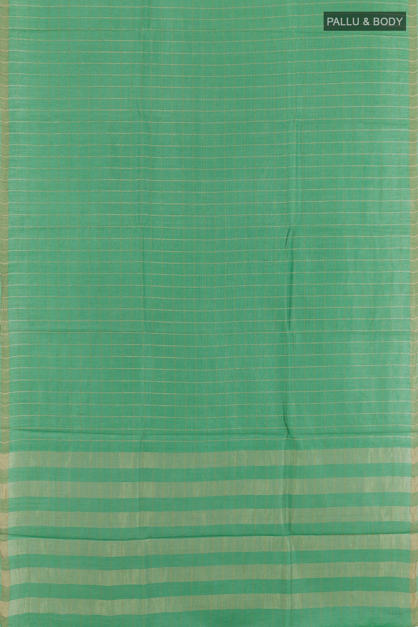 Flat view of Green Tussar Saree with Checked design on the body and Zari Border. 