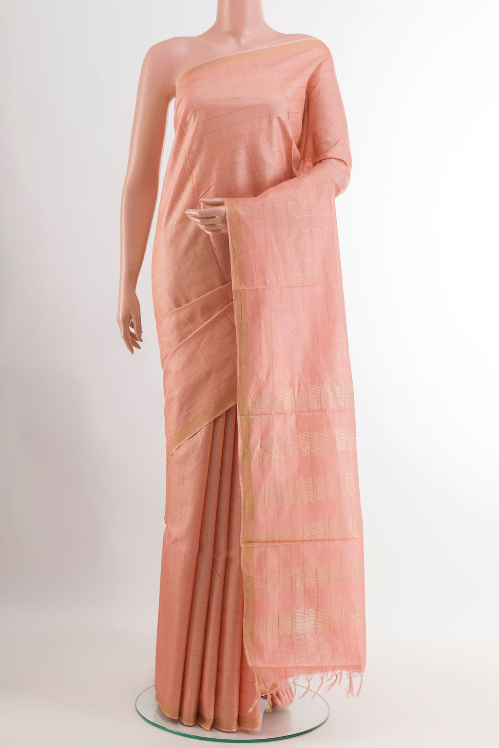 Pink Tussar Saree with Checked design on the body and Zari Border.  displayed on a mannequin