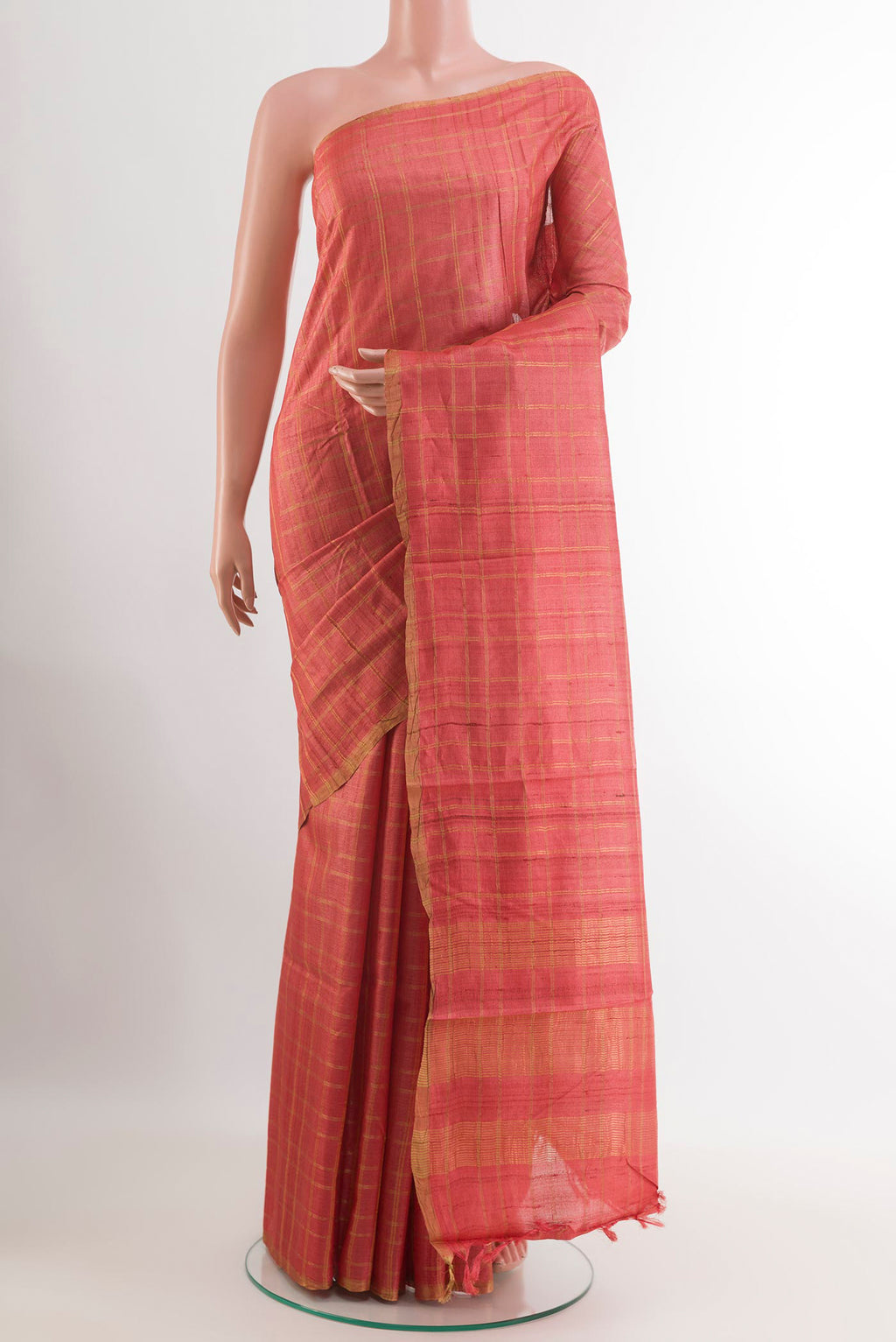 Pink Tussar Saree with Checked design on the body and Zari Border.  displayed on a mannequin