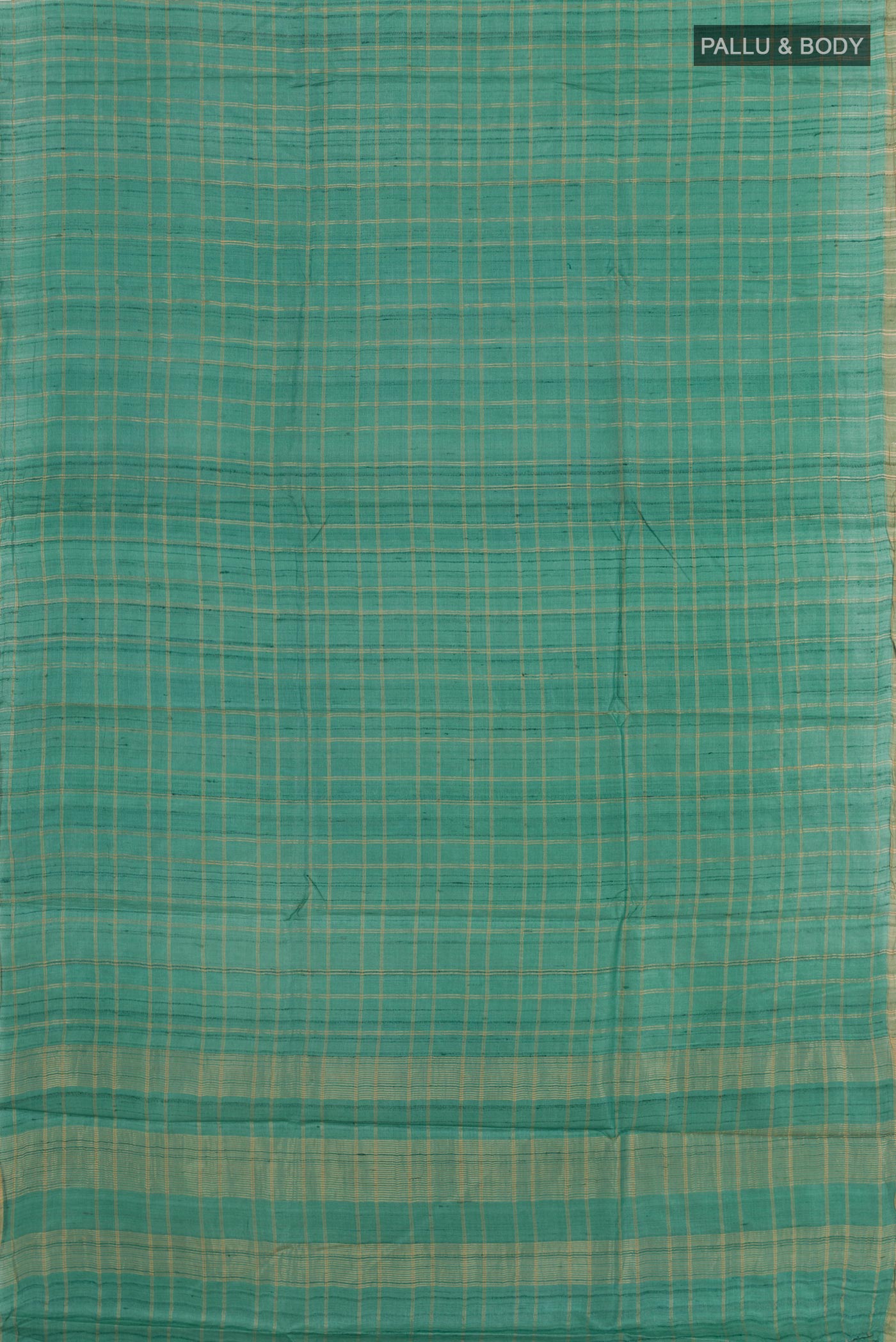 Flat view of Green Tussar Saree with Checked design on the body and Zari Border. 