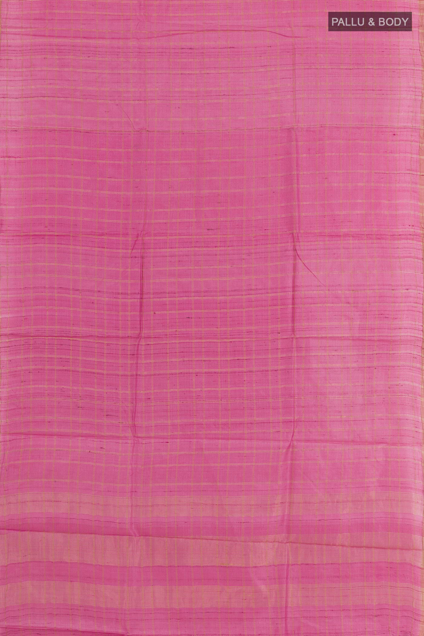 Flat view of Pink Tussar Saree with Checked design on the body and Zari Border. 
