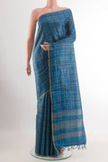 Blue Tussar Saree with Checked design on the body and Zari Border.  displayed on a mannequin