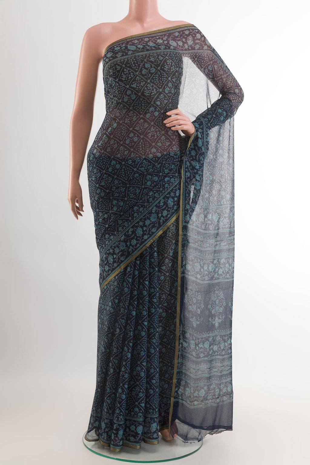 Blue Chiffon Saree with Printed design on the body and Printed Border.  displayed on a mannequin