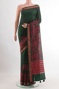 Green Tussar Saree with Checked design on the body and Zari Border.  displayed on a mannequin