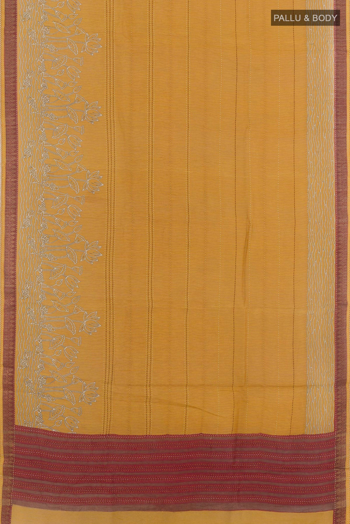 Flat view of Yellow Tussar Saree with Printed design on the body and Zari Border. 