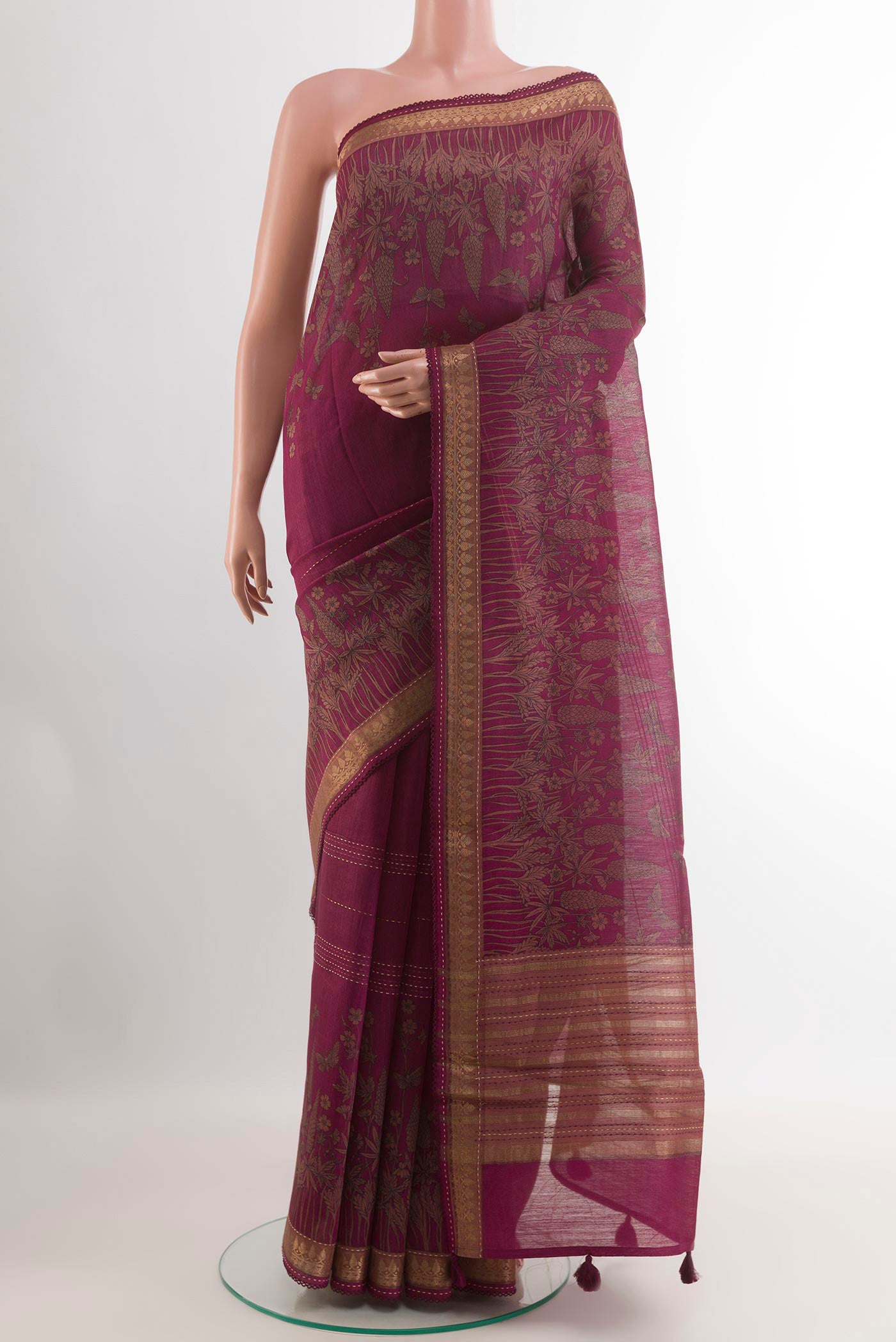 Purple Tussar Saree with Stripes on the body and Zari Border.  displayed on a mannequin