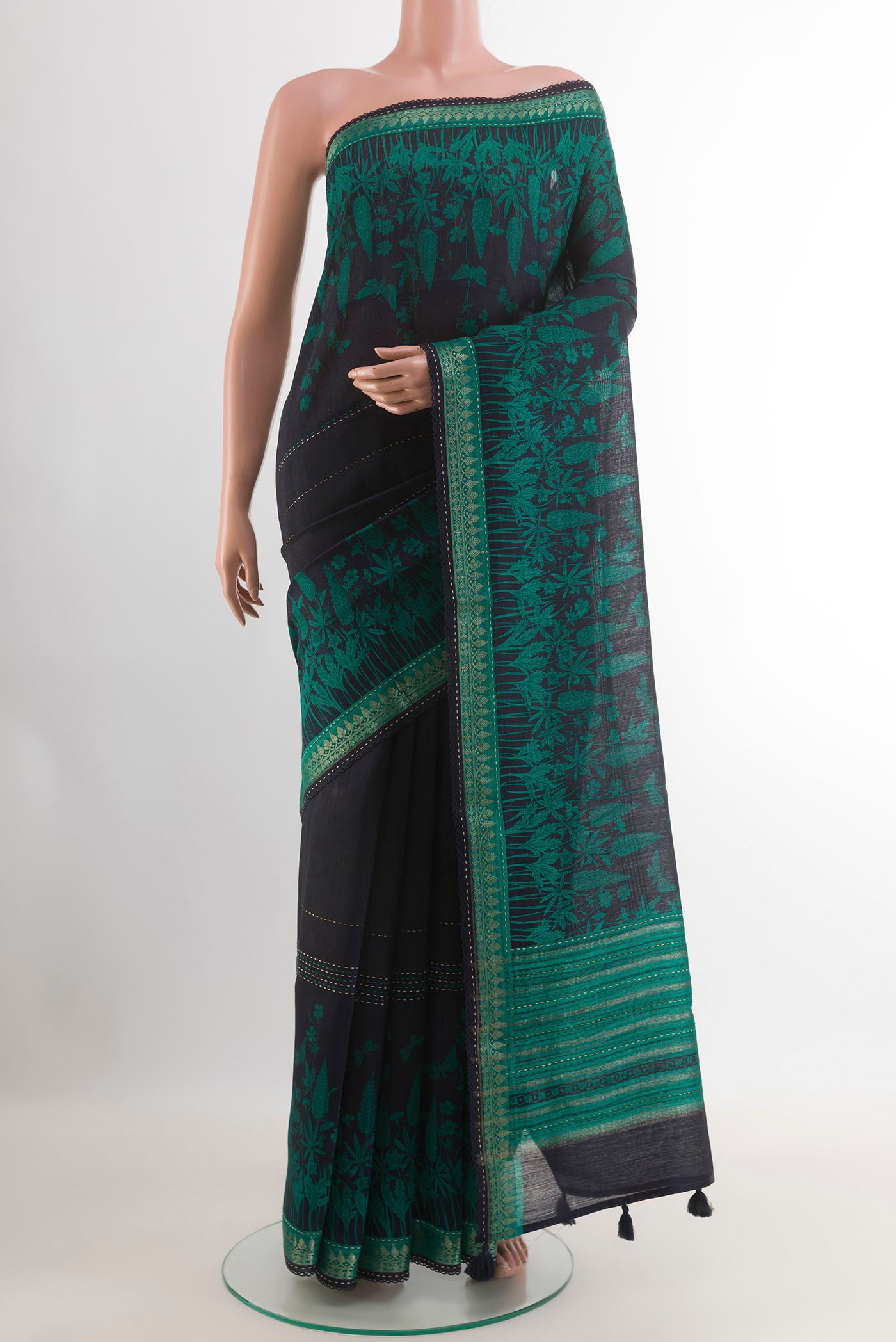 Blue Tussar Saree with Stripes on the body and Zari Border.  displayed on a mannequin
