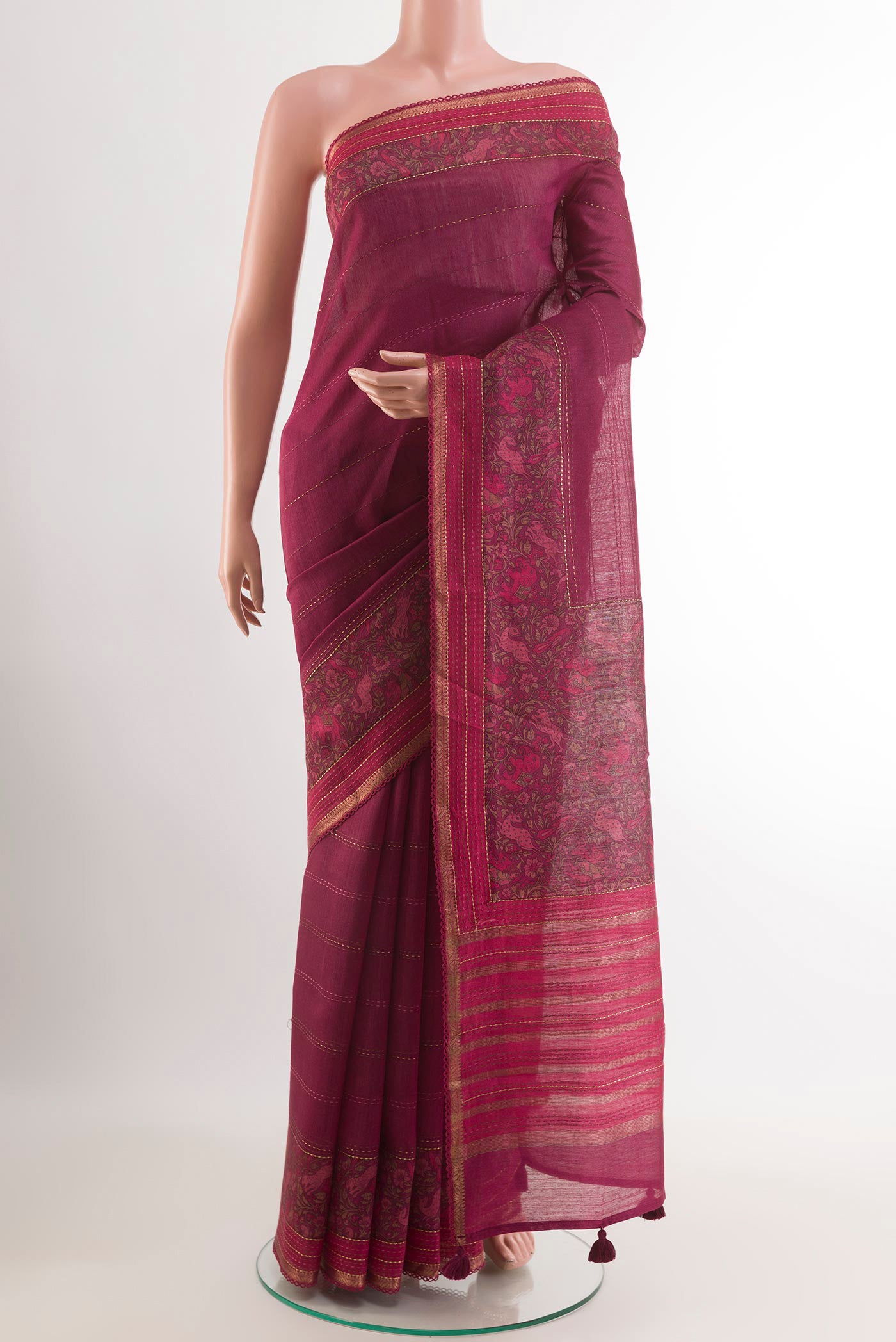 Purple Tussar Saree with Stripes on the body and Zari Border.  displayed on a mannequin