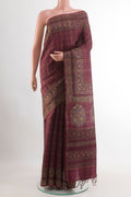 Magenta Tussar Saree with Checked design on the body and Zari Border.  displayed on a mannequin