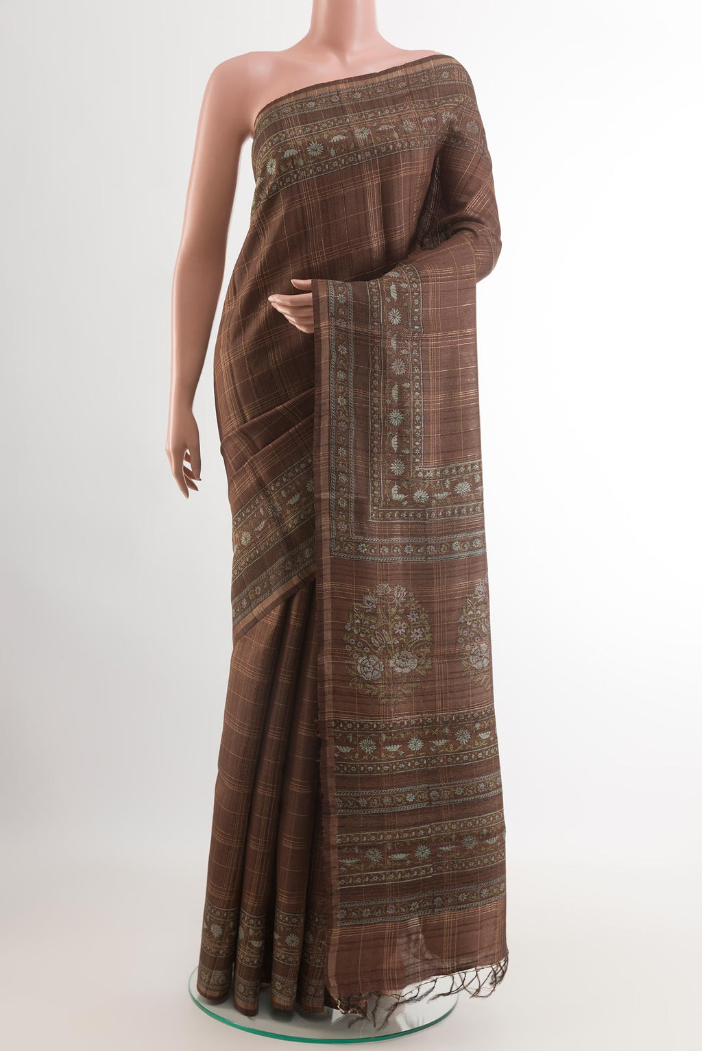 Brown Tussar Saree with Checked design on the body and Zari Border.  displayed on a mannequin