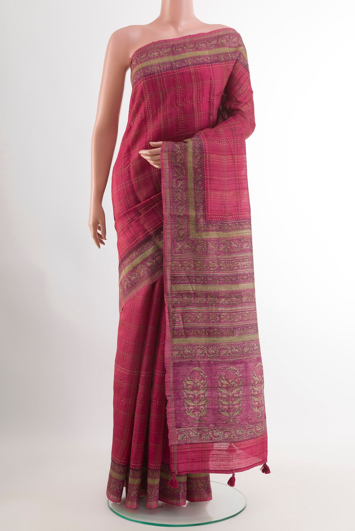 Pink Tussar Saree with Checked design on the body and Zari Border.  displayed on a mannequin
