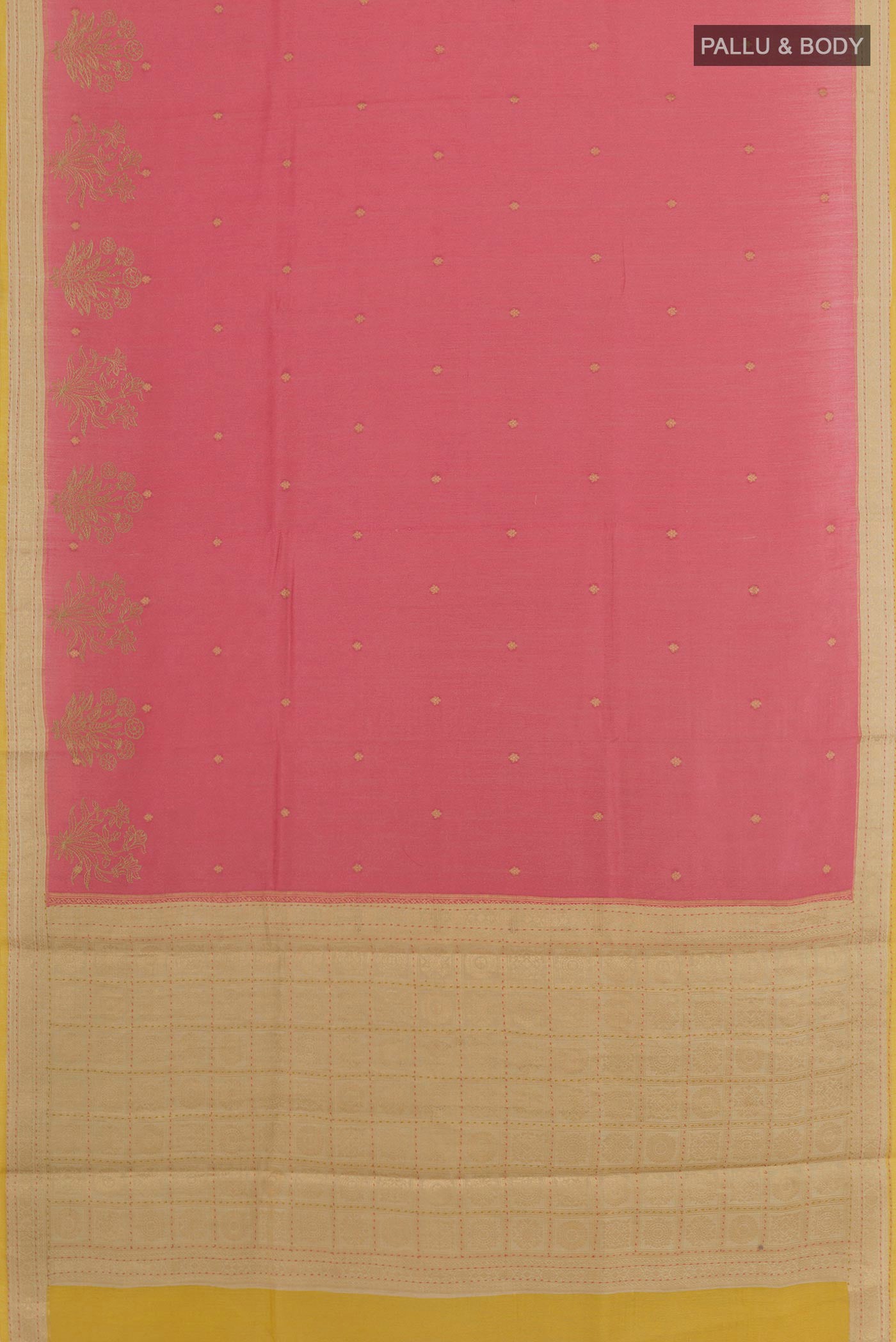 Flat view of Pink Tussar Saree with Zari Butta on the body and Zari Border. 