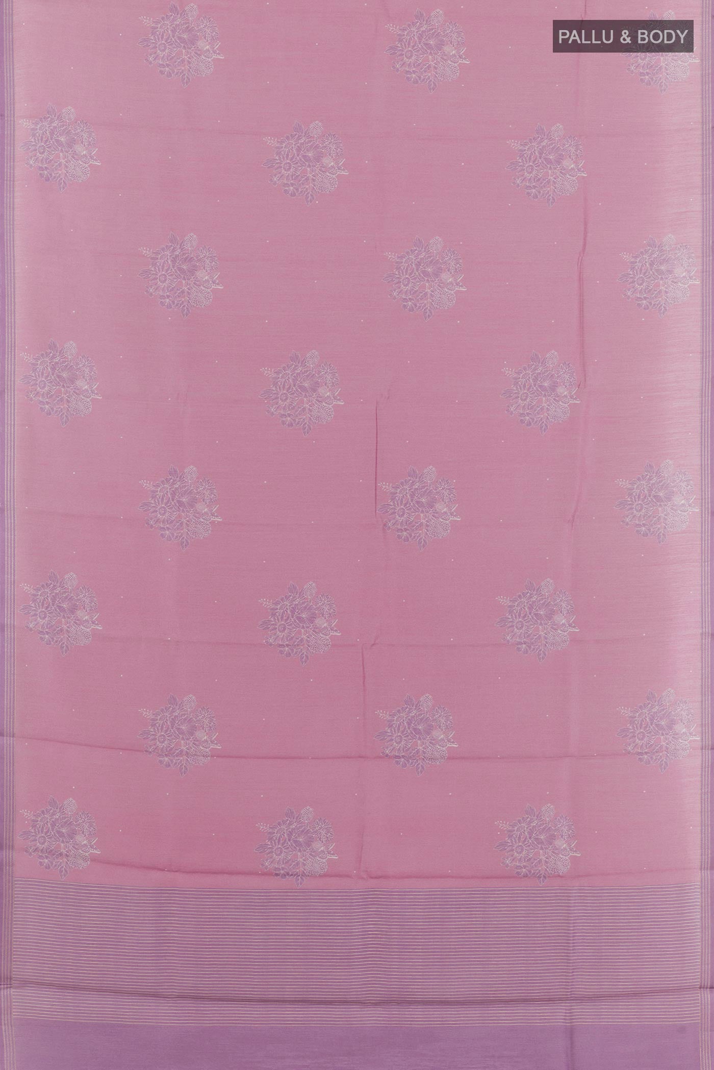 Flat view of Lavender Tussar Saree with Printed design on the body and Zari Border. 