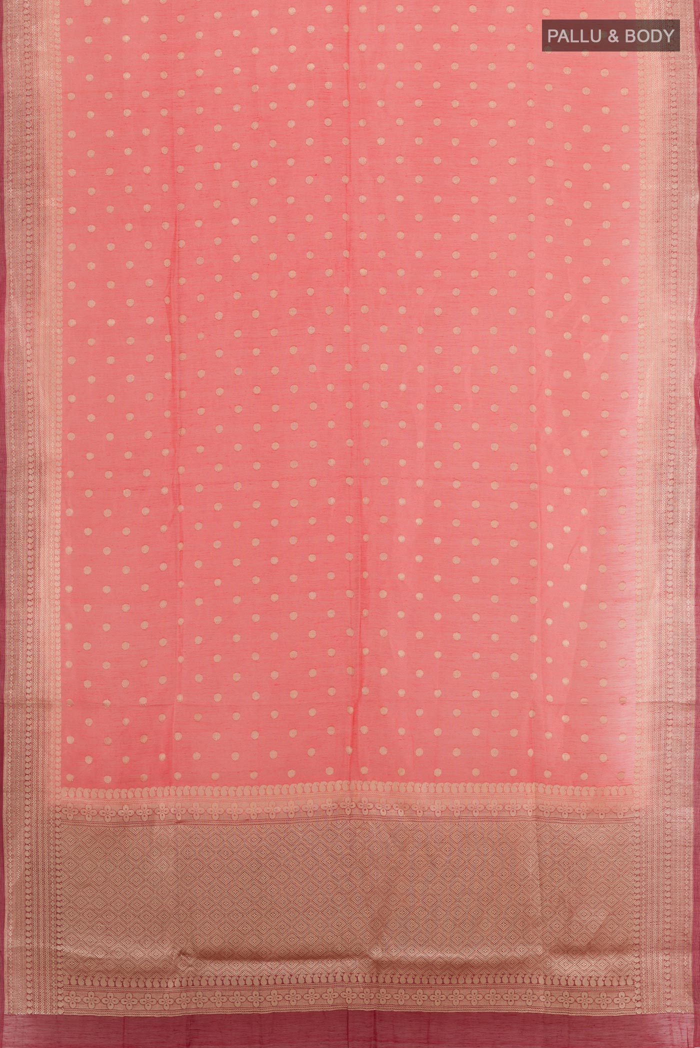 Flat view of Pink Linen Saree with Zari Butta on the body and Zari Border. 