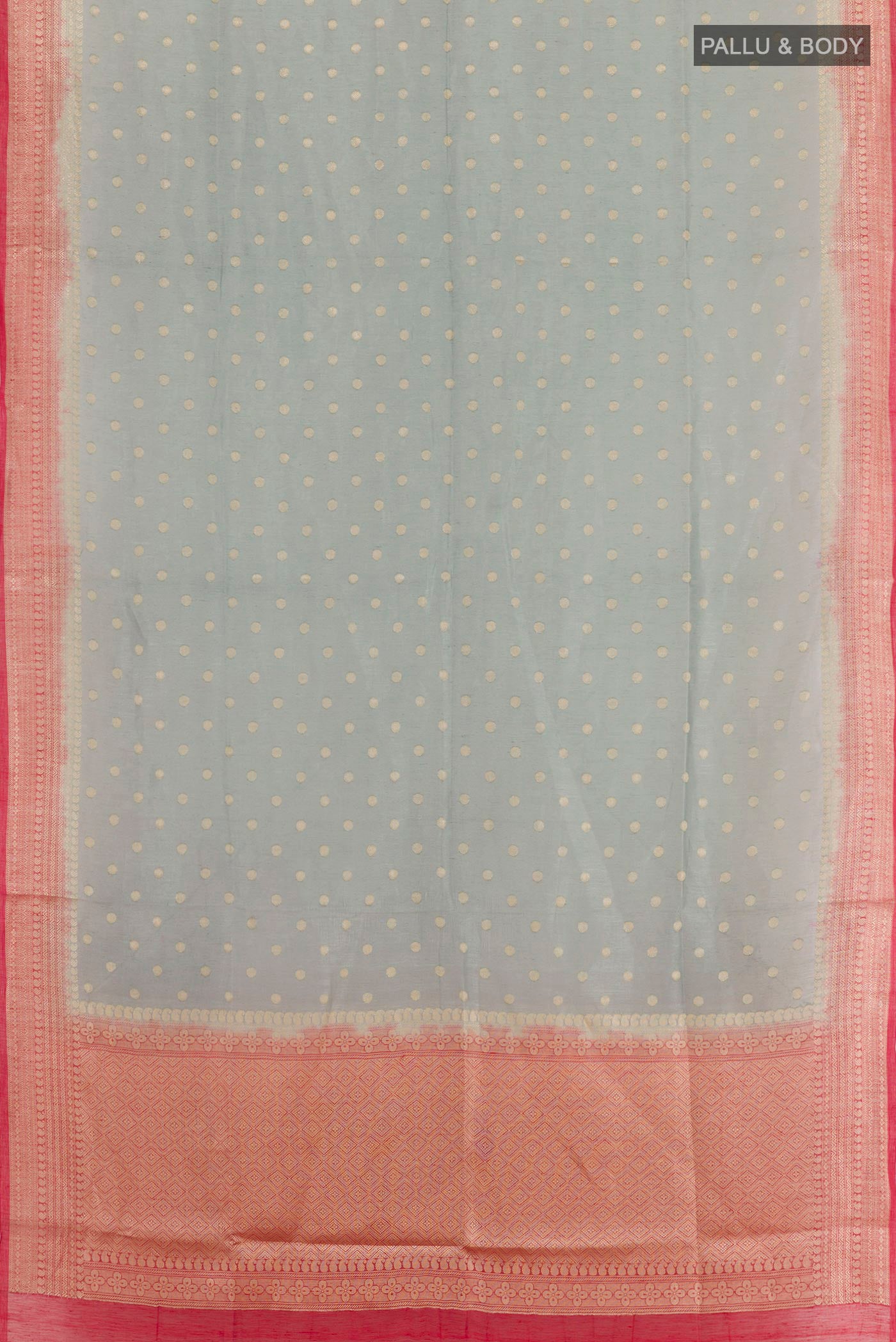 Flat view of Grey Linen Saree with Zari Butta on the body and Zari Border. 