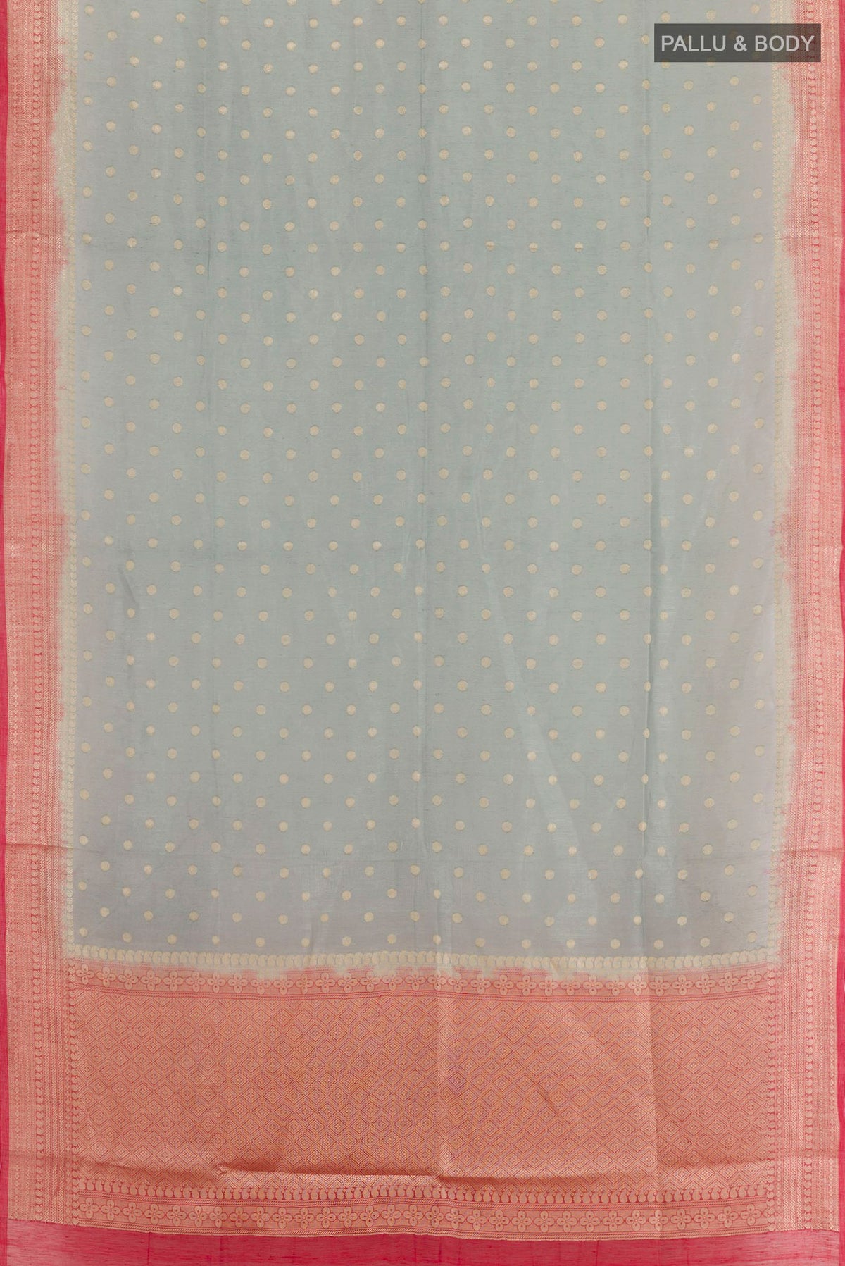 Flat view of Grey Linen Saree with Zari Butta on the body and Zari Border. 