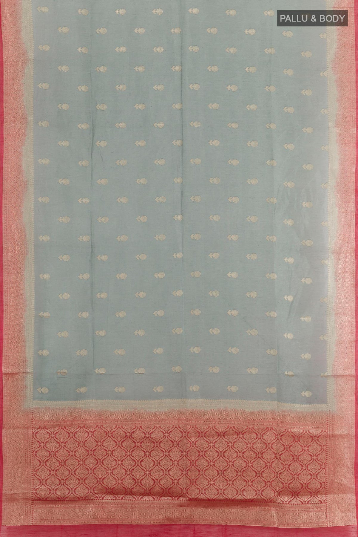 Flat view of Grey Linen Saree with Zari Butta on the body and Zari Border. 