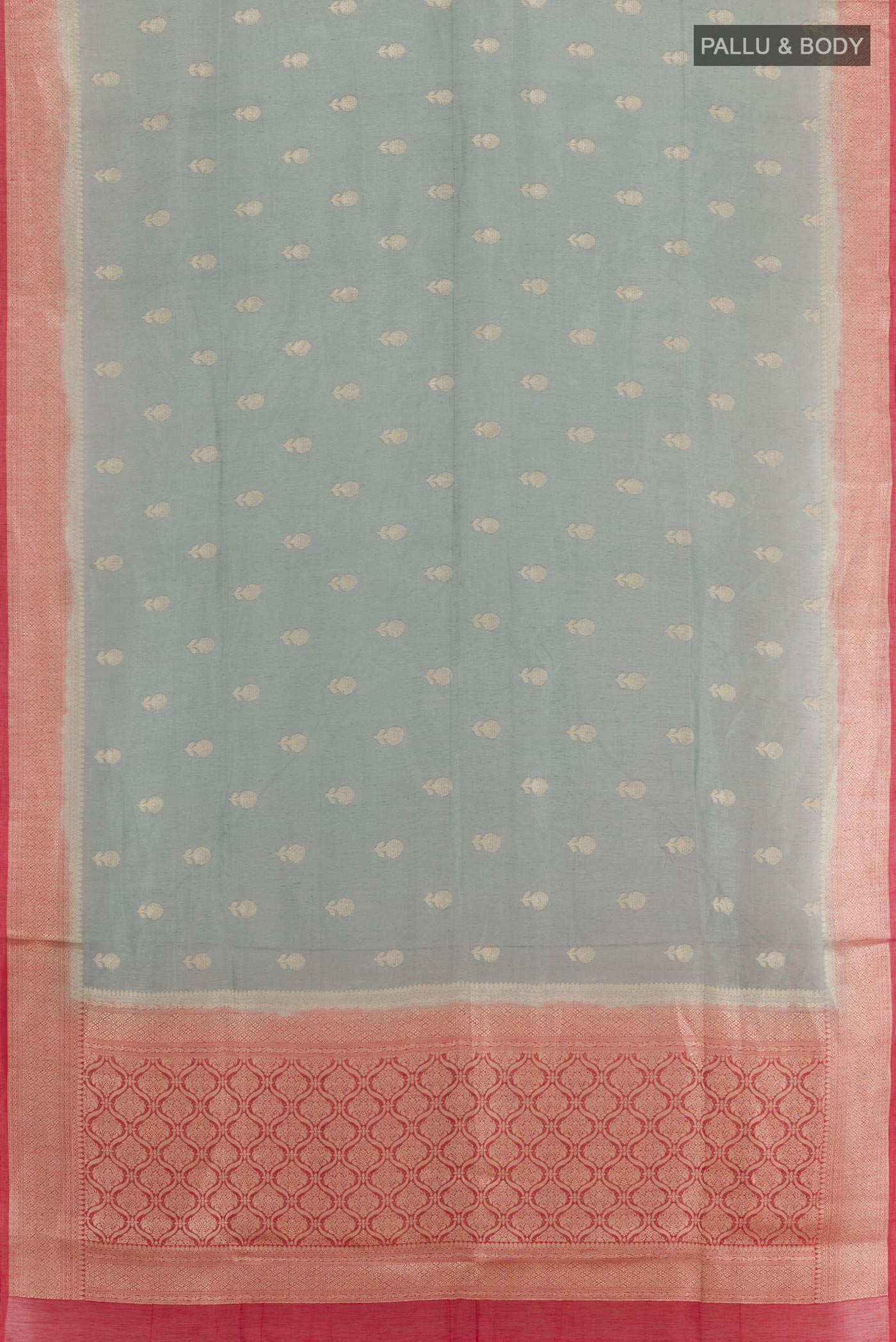 Flat view of Grey Linen Saree with Zari Butta on the body and Zari Border. 