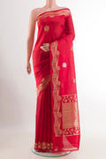 Red Tussar Silk Saree with Zari Butta on the body and Zari Border.  displayed on a mannequin