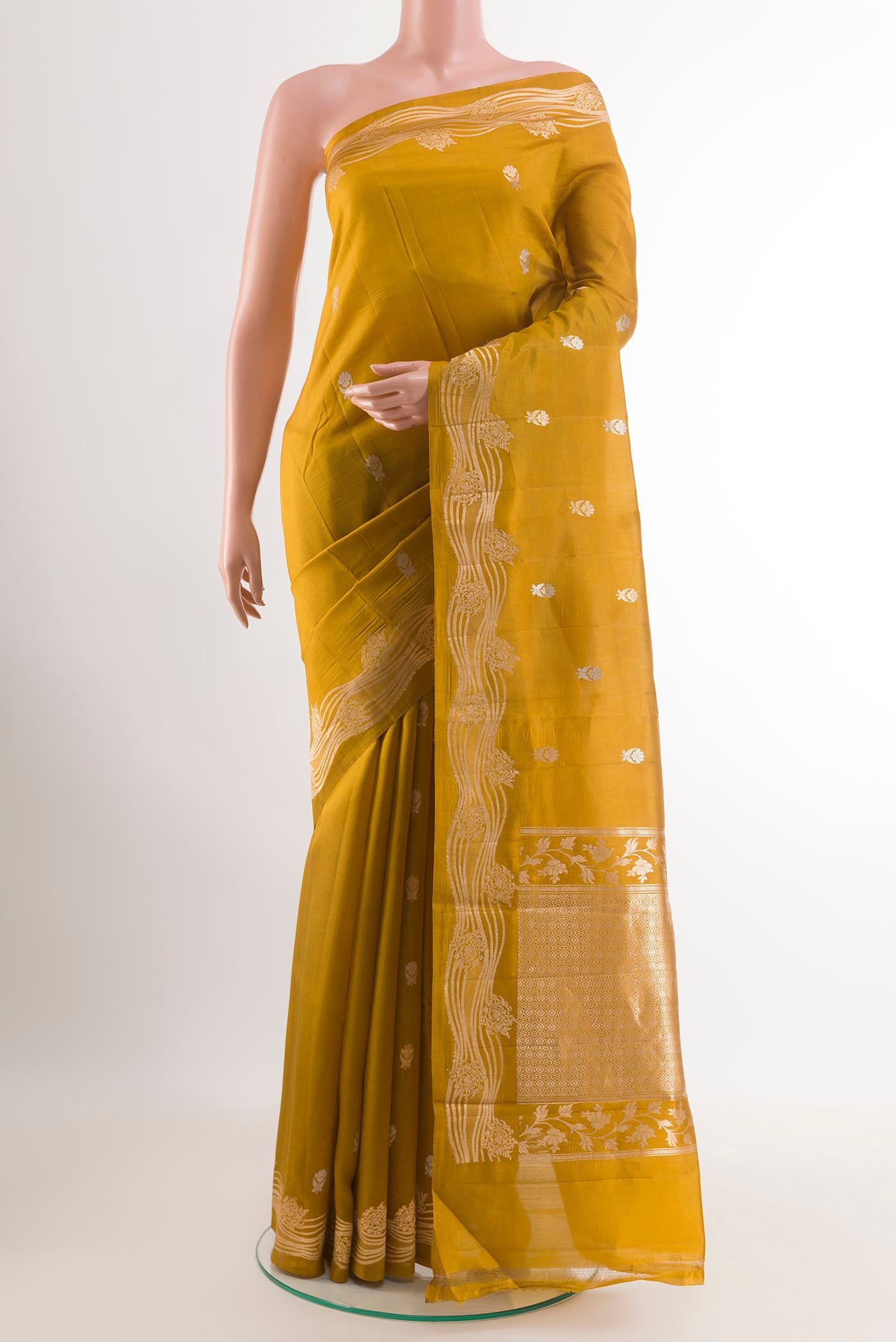 Yellow Banarasi Katan Silk Saree with Zari Butta on the body and Zari Border.  displayed on a mannequin