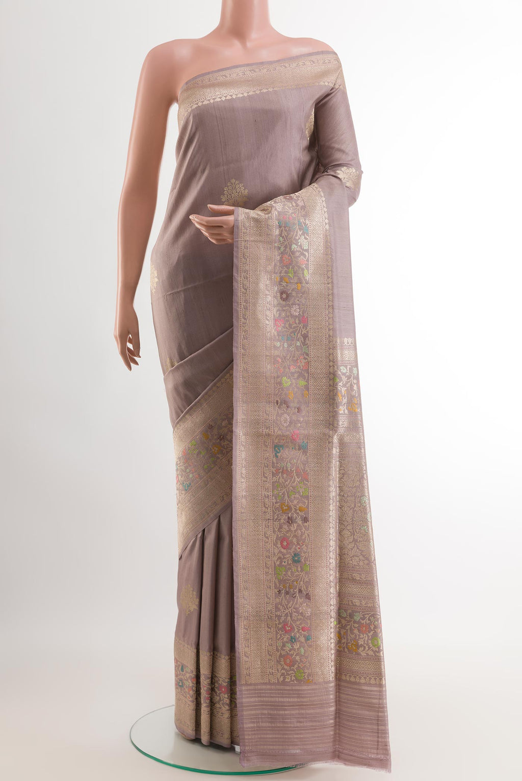 Lavender Banarasi Tussar Silk Saree with Zari Butta on the body and Zari Border.  displayed on a mannequin