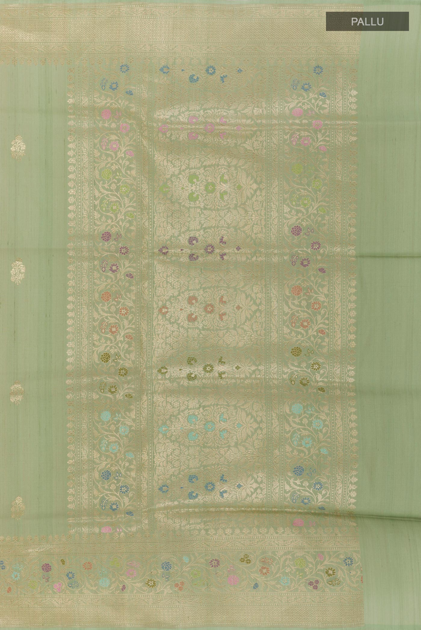 Close up image of the pallu of Pista Green Banarasi Tussar Silk Saree with Zari Butta on the body and Zari Border. 