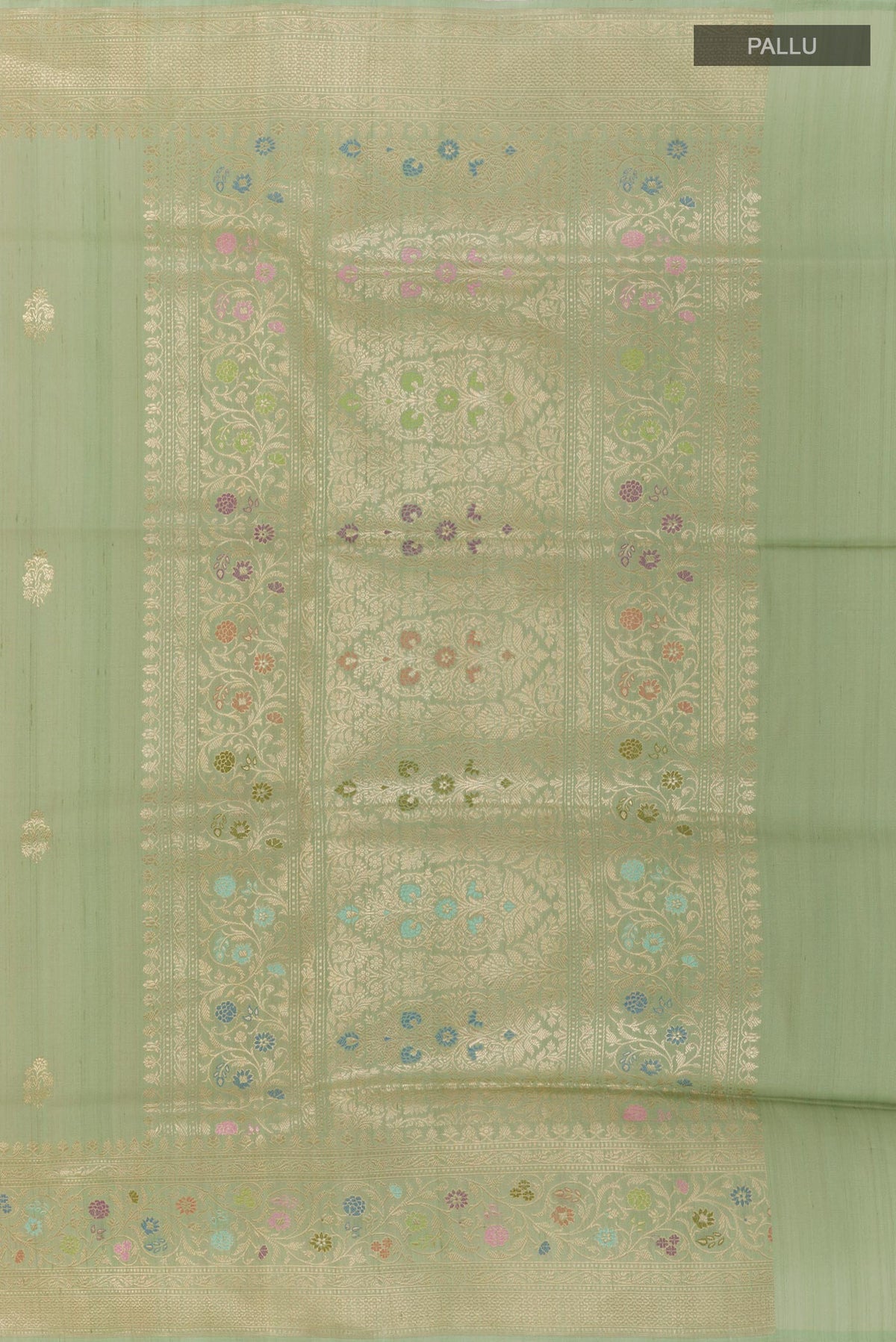 Close up image of the pallu of Pista Green Banarasi Tussar Silk Saree with Zari Butta on the body and Zari Border. 