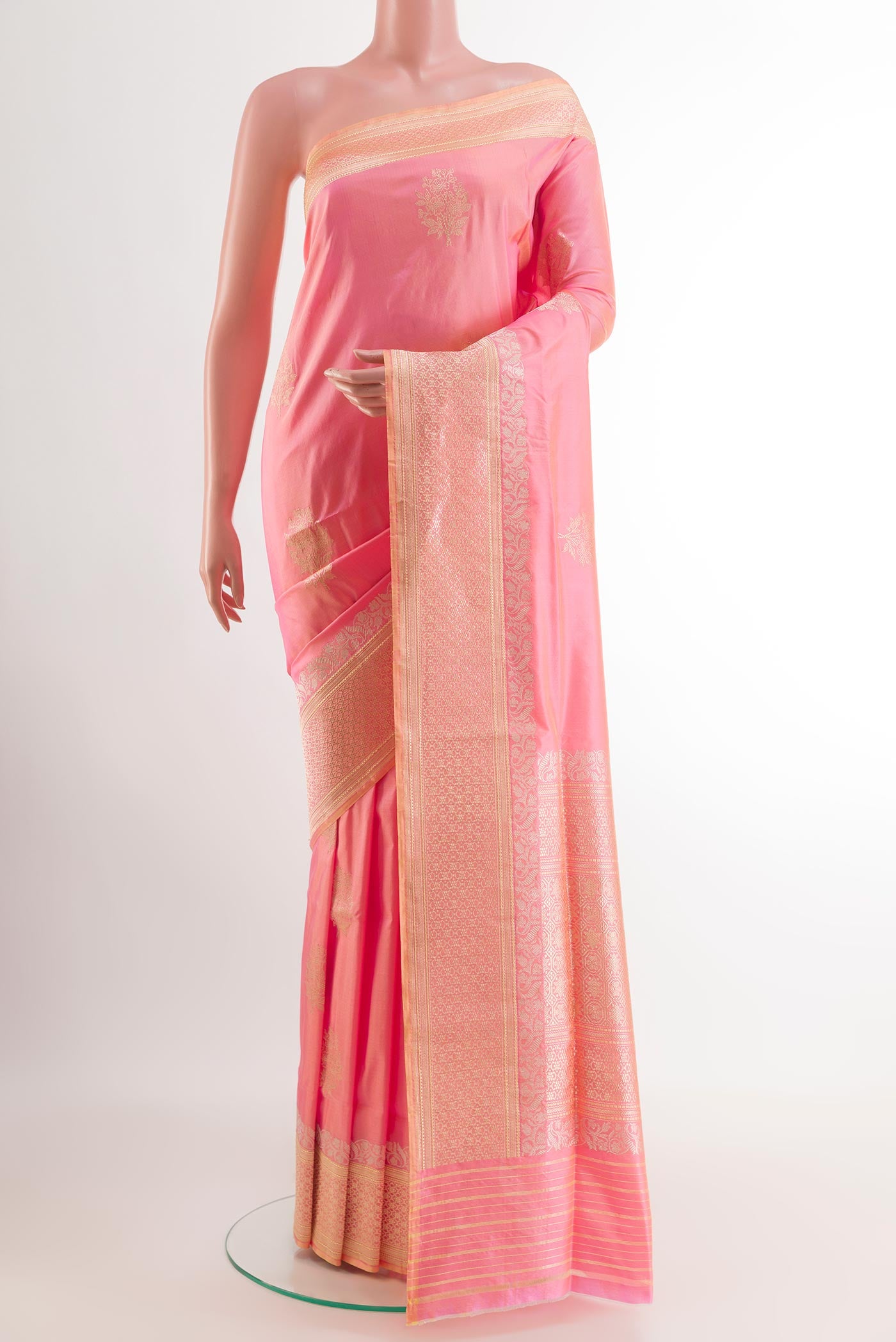 Rose pink Banarasi Silk Saree with Zari Butta on the body and Zari Border.  displayed on a mannequin
