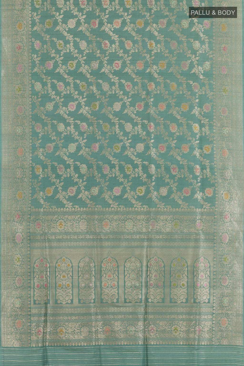 Flat view of Blue Banarasi Tussar Silk Saree with Zari Brocade on the body and Zari Border. 