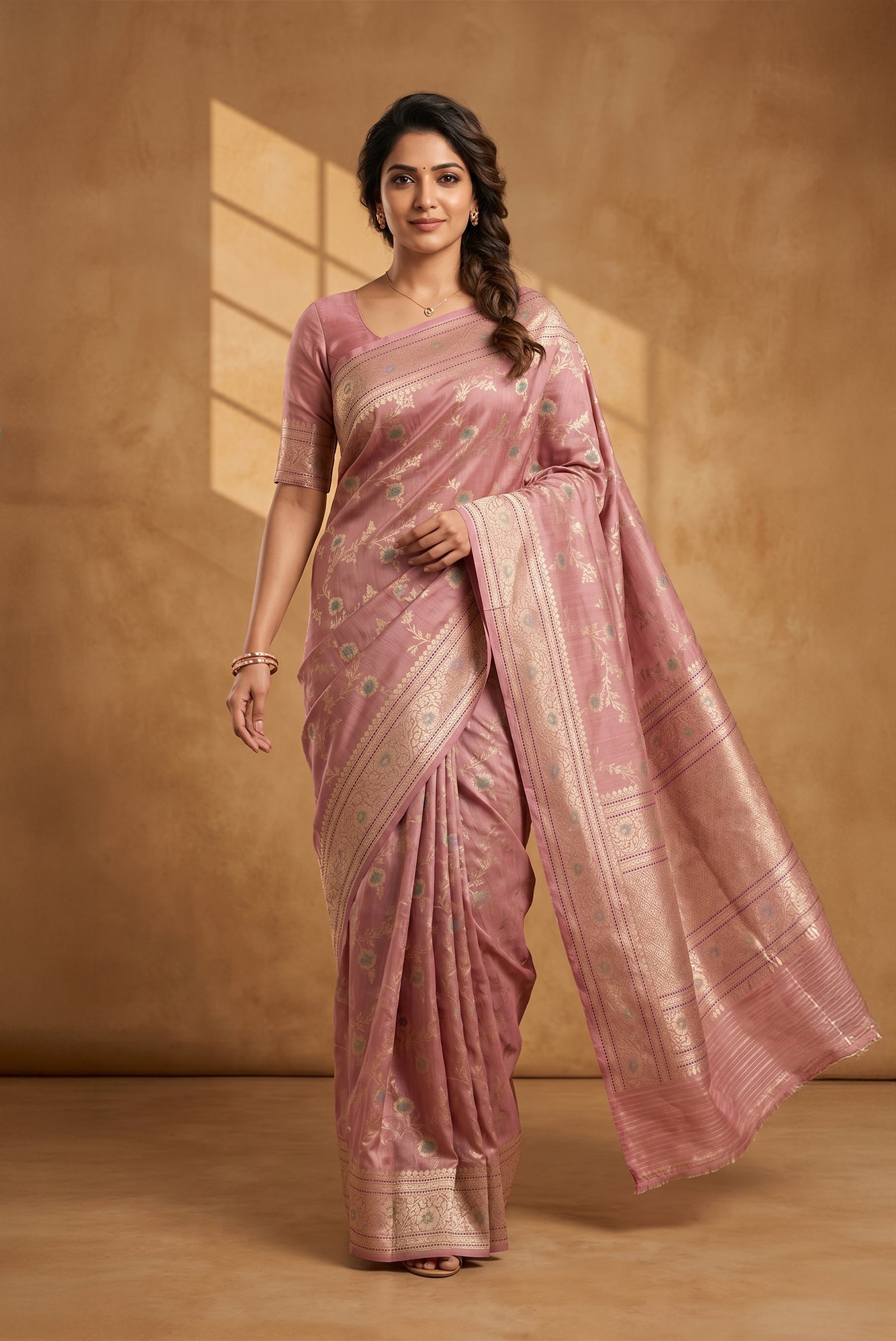 Model wearing a Rose pink Banarasi Tussar Silk Saree with Zari Brocade on the body and Zari Border.