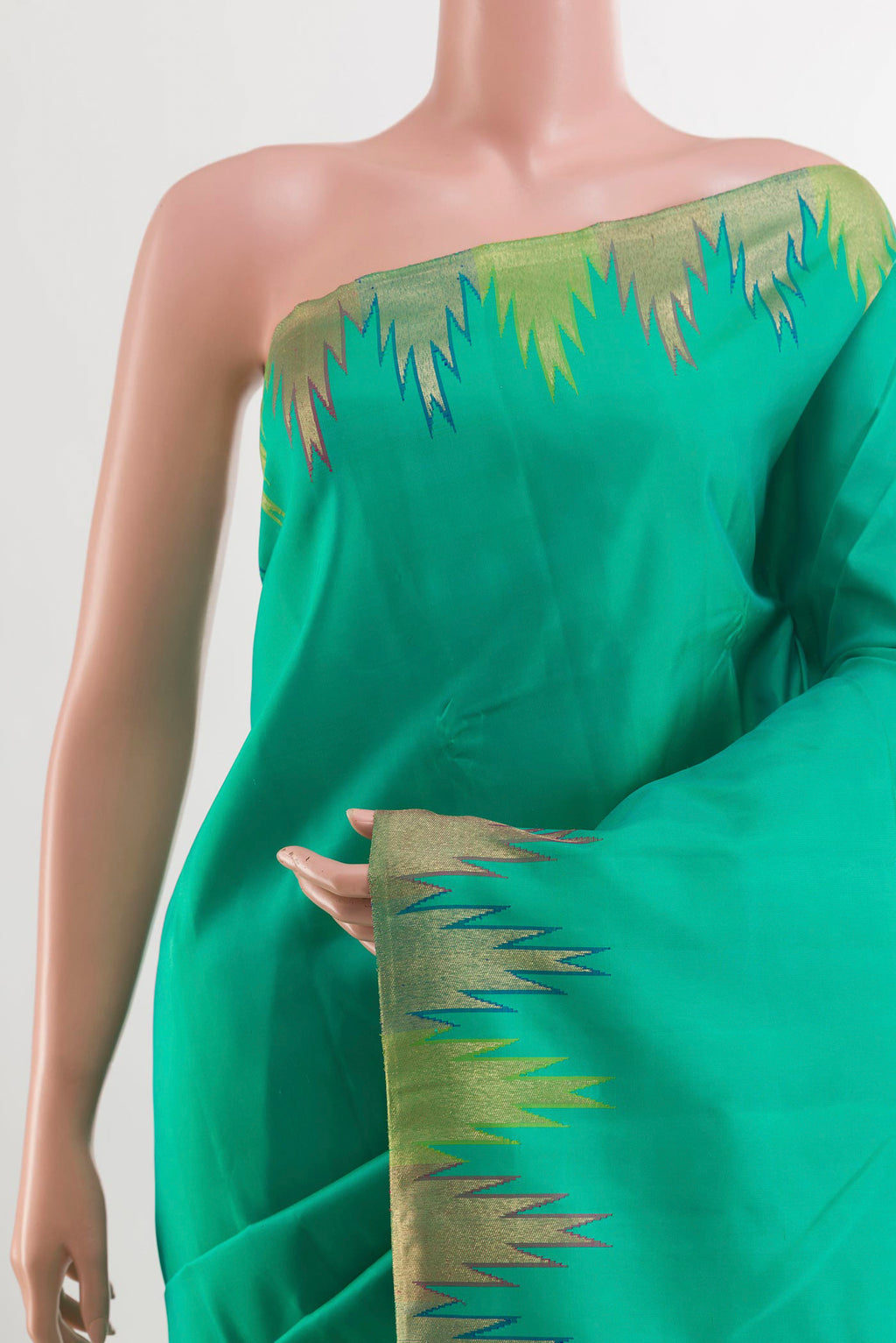 Border image of Green Kanchipuram Silk Saree with Plain Body and Zari Border. 