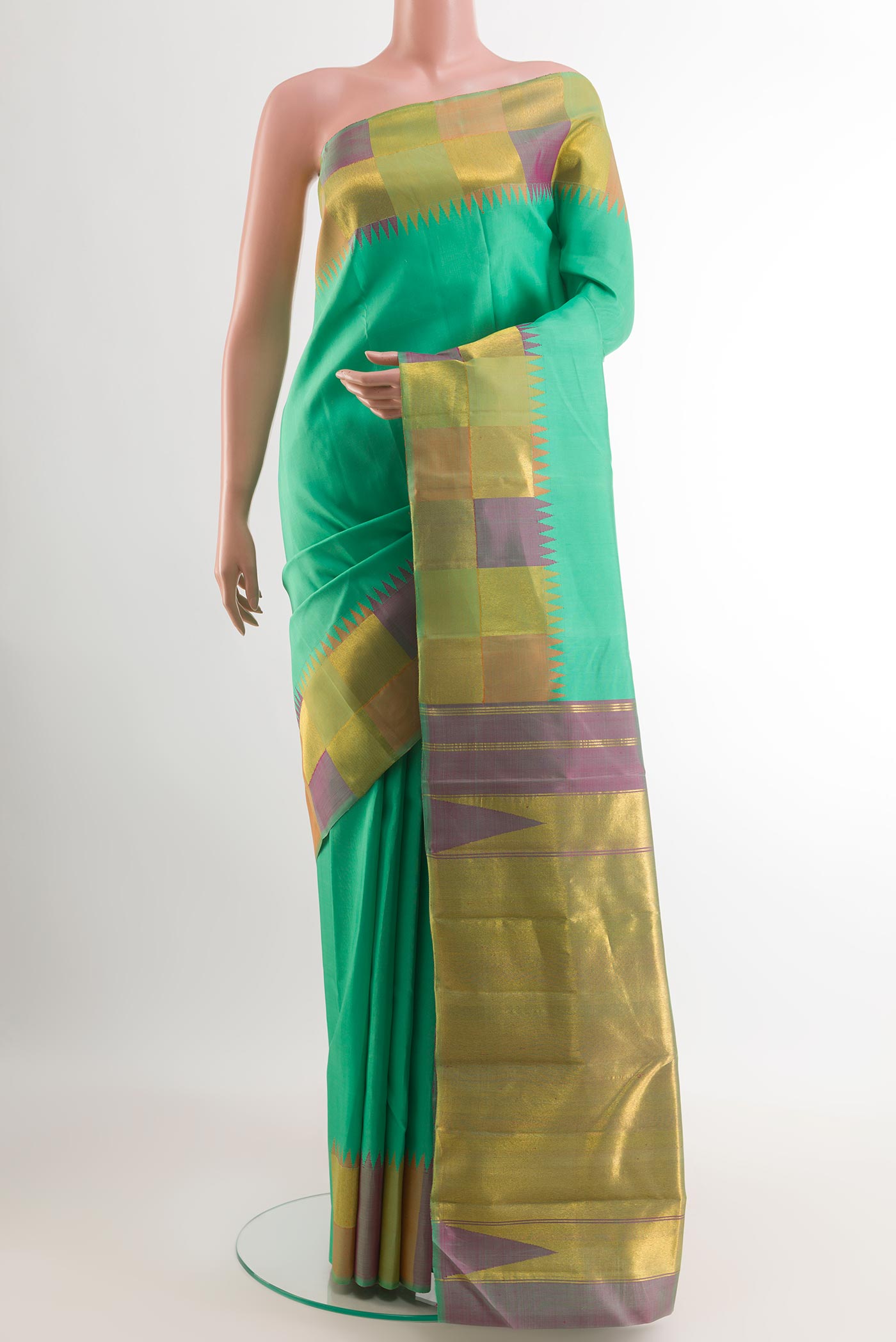 Sea Green Kanjivaram Silk Saree with Plain Body and Zari Border.  displayed on a mannequin